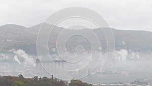 Ãšsti nad Labem, Czechia cityscape panorama. Factory smog fog town, air pollution 8K timelapse