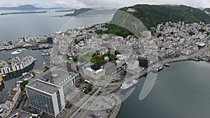 Ã…lesund, Norway â€“ July 14th 2017 â€“ Ascending over the famous city center of Ã…lesund.