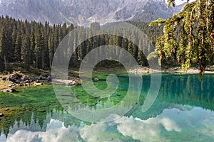 ï»¿ï»¿reflections on Lake Carezza karersee, Nova Levante, South Tyrol.