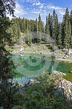 ï»¿ï»¿reflections on Lake Carezza karersee, Nova Levante, South Tyrol.