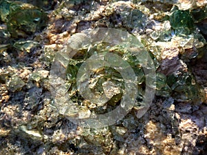 Ð’ackground of small glass stones on a large stone