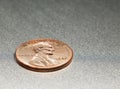 1 Dollar Cent with Lincoln on an alloy board Royalty Free Stock Photo