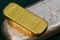 1 Ounce Gold Bullion Bar (ingot) Silver Bar Below Royalty Free Stock Photo