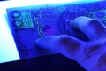 100 pln polish banknote in ultraviolet light