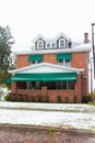 1920's Era Home with Green Awnings