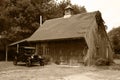 1927 Model T Ford & Old Barn Royalty Free Stock Photo