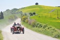 A 1927 red Lancia Lambda