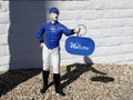 1950s: Blue lawn jockey welcome