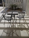 1950s Modernist garden: table and chairs Royalty Free Stock Photo