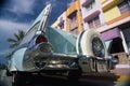 1957 Chevrolet parked in front of a building