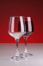 2 glasses on a red background
