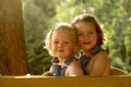 2 Pretty girls in a wagon