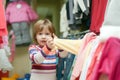 2 years baby in clothes shop