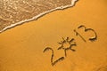 2013 - written in sand on beach texture Royalty Free Stock Photo