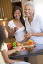 3 Generation Family Preparing a Meal Royalty Free Stock Photo