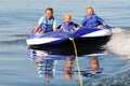 3 Kids on Water Tube Royalty Free Stock Photo