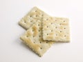 3 Salted stacked Crackers on white Royalty Free Stock Photo