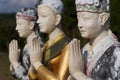 3 statues in luang namtha, laos