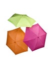 three colored umbrellas green pink orange color isolated on white background Royalty Free Stock Photo