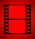 35mm movie Film in red light Royalty Free Stock Photo