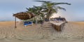 360 hdri panorama with coconut trees on ocean coast near tropical shack or open cafe on beach with sunbeds in equirectangular Royalty Free Stock Photo
