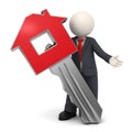 3d business man with house or home key