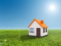 3d house, green grass and blue sky Royalty Free Stock Photo