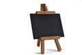 3D isolated blackboard with easel (for your text) Royalty Free Stock Photo