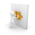 3d man pushing puzzle piece into wall Royalty Free Stock Photo