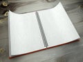 3d open blank notebook on desk paper texture