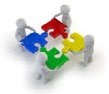 3d small people - team with the puzzles in hands Royalty Free Stock Photo