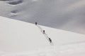 4 Skieurs Crossing a Shoulder of the Mt Blanc Royalty Free Stock Photo
