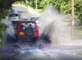 4x4 car driving through flood water Royalty Free Stock Photo