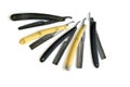 5 old straight razors isolated Royalty Free Stock Photo