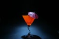 5 second time laps aka Bulb exposure of orange liquid in a martini glass Royalty Free Stock Photo