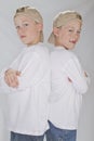 6 years old identical twins wearina a baseball hat Royalty Free Stock Photo