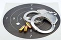 9mm Luger Ammunition and Handcuff Royalty Free Stock Photo