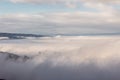 A view of St.Francis church in Assisi Umbria, Italy barely visible in the middle of fog Royalty Free Stock Photo