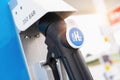 Aachen, Germany, January 2021: hydrogen logo on gas stations fuel dispenser. h2 combustion engine for emission free eco friendly Royalty Free Stock Photo