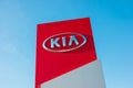 AACHEN, GERMANY JANUARY, 2017: Kia dealership sign against blue sky. Kia is South Korea`s second-largest automobile manufacturer Royalty Free Stock Photo