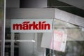 AACHEN, GERMANY - NOVEMBER 9, 2022: Selective blur on a marklin logo on a reseller of Aachen. Marklin is a german toy producer