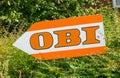 AACHEN, GERMANY OCTOBER, 2017: OBI market sign on a shield. Obi is the largest hardware and do-it-yourself retailer in Germany