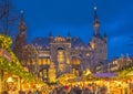 The Aachen town hall and the annual famous Christmas market at night. Royalty Free Stock Photo