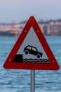 A warning sign in the harbor of Aalborg, Denmark at a cold day in spring. Royalty Free Stock Photo