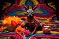 aalebrije on a handwoven mexican blanket with clay pottery around