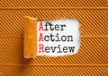 AAR After action review symbol. Concept words AAR After action review on beautiful white paper. Beautiful brown paper background.