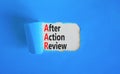 AAR After action review symbol. Concept words AAR After action review on beautiful white paper. Beautiful blue paper background.