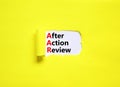 AAR After action review symbol. Concept words AAR After action review on beautiful white paper. Beautiful yellow paper background