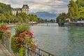 Aare reiver from city of Thun with Swiss Alps in background, Switzerland