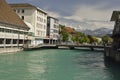 Aare reiver from city of Thun with Swiss Alps in background, Switzerland